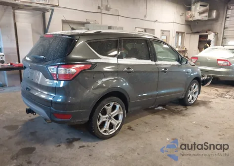 2018 Ford Escape Titanium z USA, uszkodzony, nr VIN 1FMCU0J91JUD47261